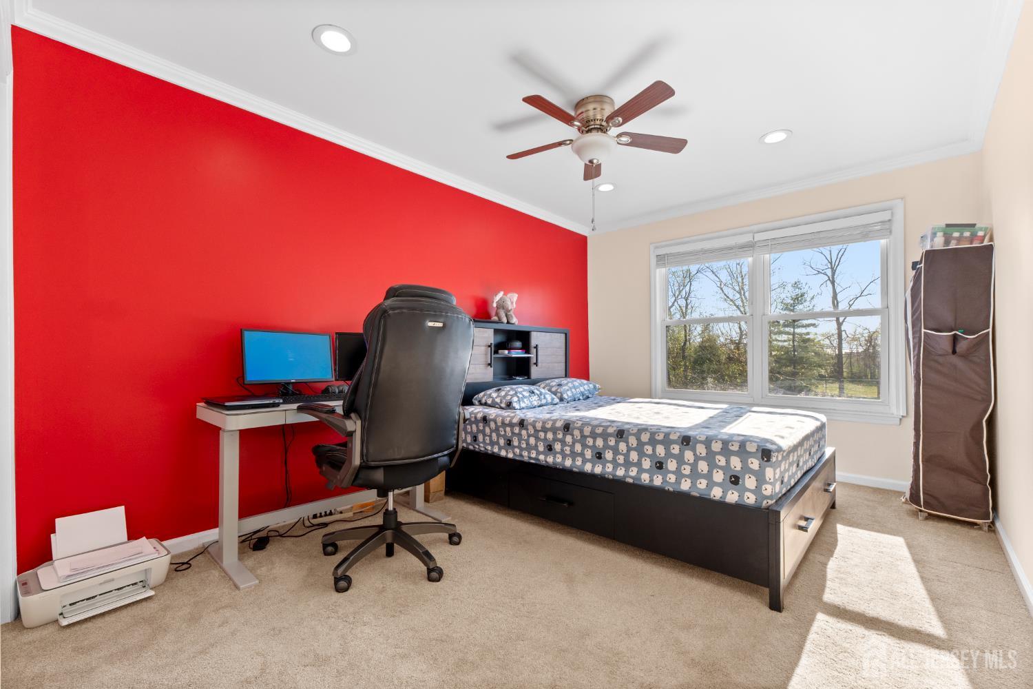 114 Pendleton Place Old Bridge, NJ 08857 - Photo 31 of 49 a bedroom with a bed and a chandelier