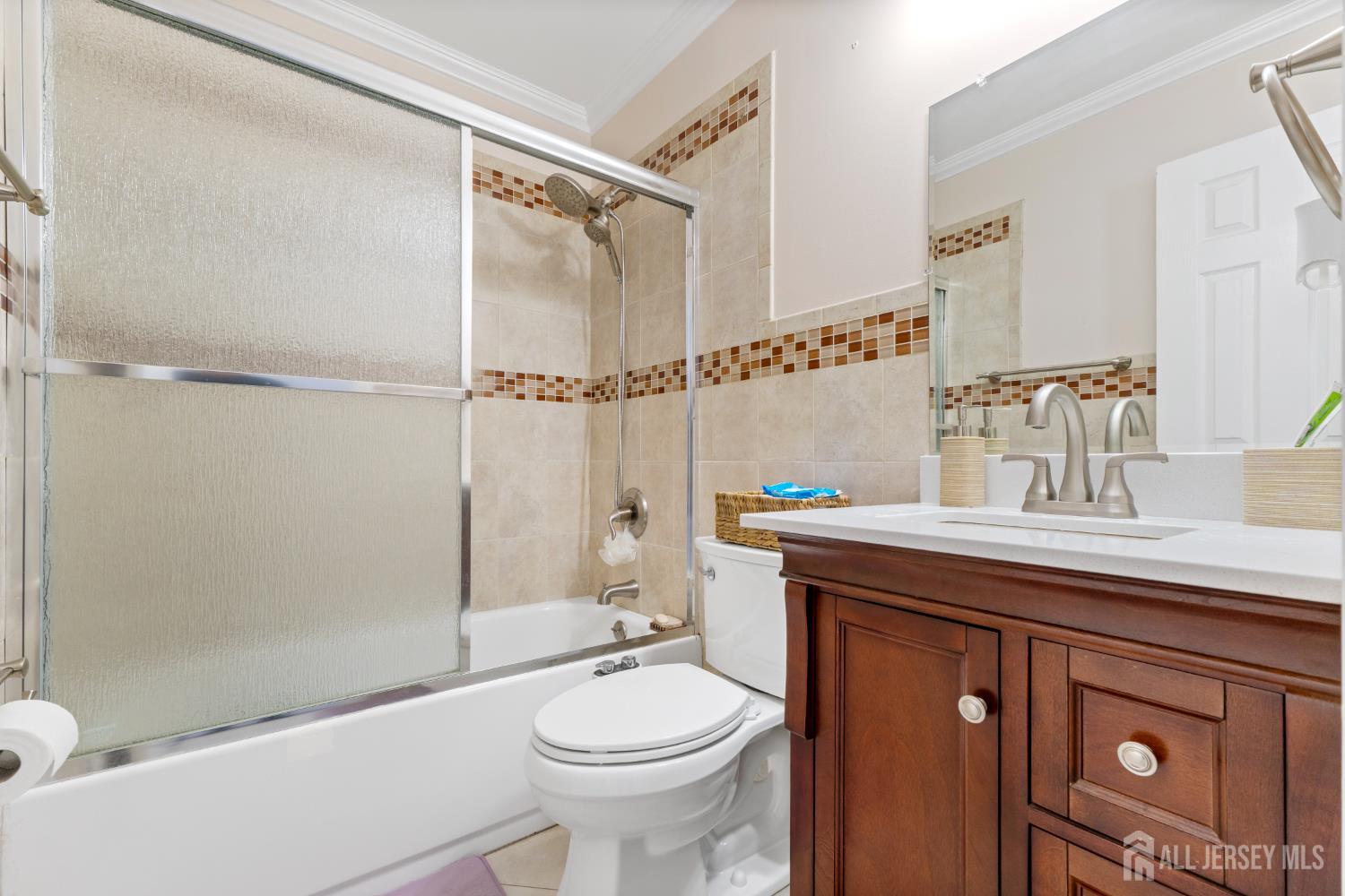 114 Pendleton Place Old Bridge, NJ 08857 - Photo 33 of 49 a bathroom with a sink a toilet and shower