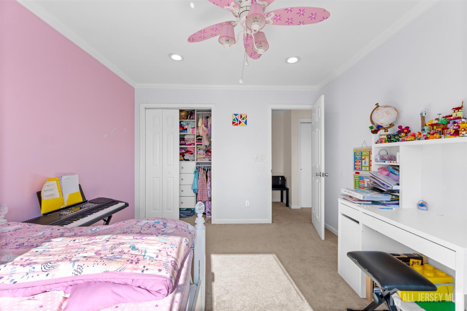 114 Pendleton Place Old Bridge, NJ 08857 - Photo 36 of 49 a bedroom with a bed and cabinets