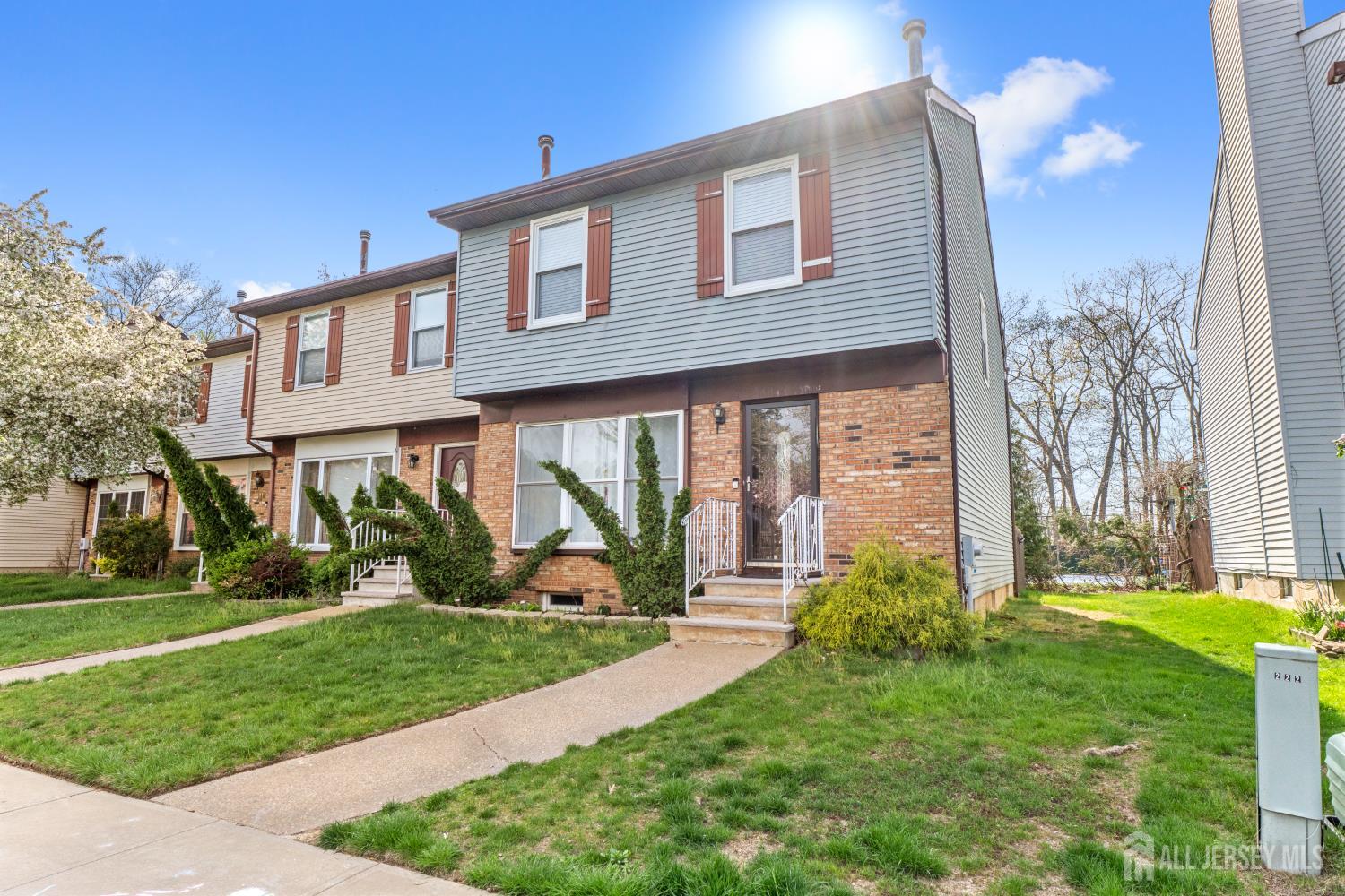 114 Pendleton Place Old Bridge, NJ 08857 - Photo 4 of 49 a front view of a house with garden