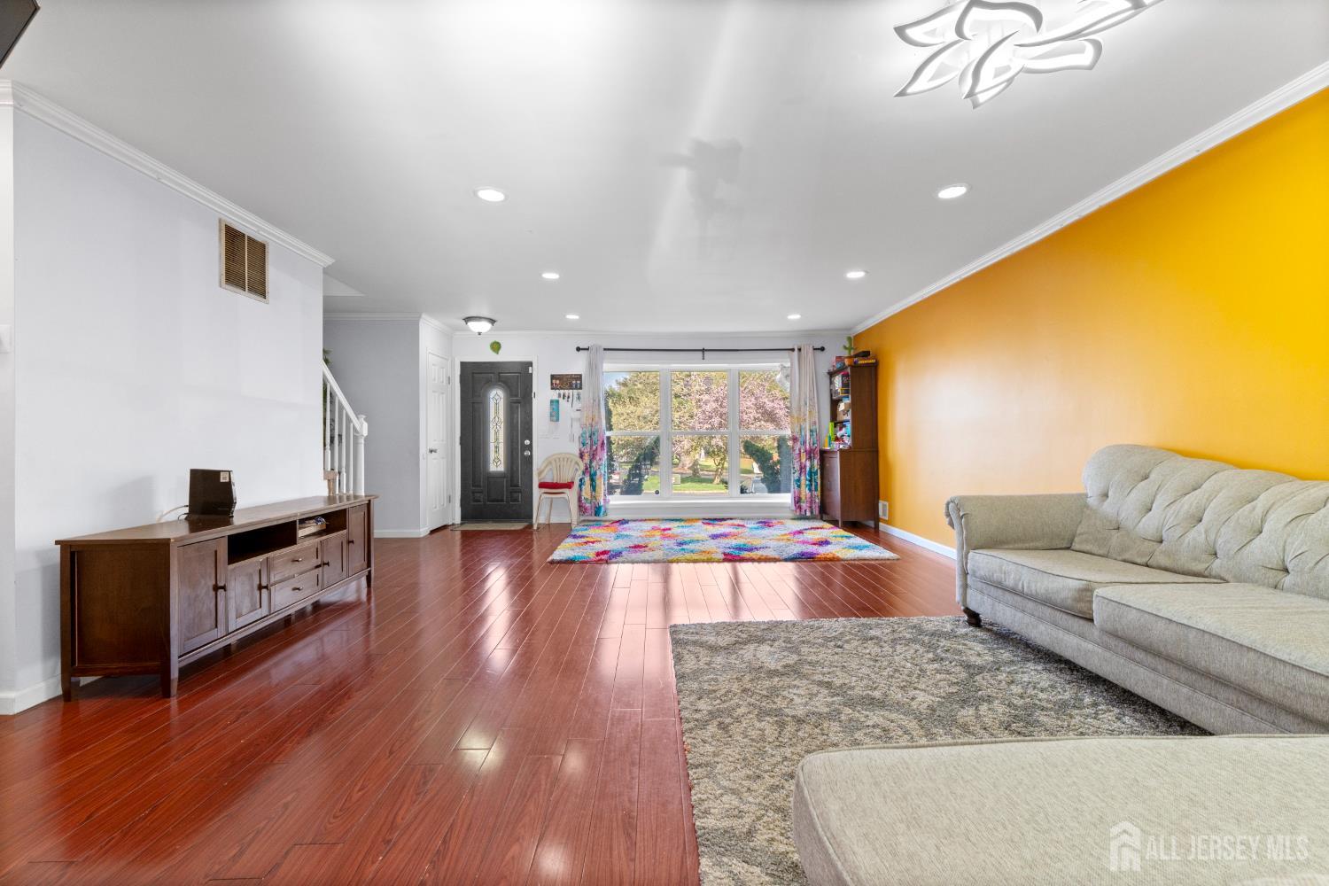 114 Pendleton Place Old Bridge, NJ 08857 - Photo 9 of 49 a living room with furniture and a flat screen tv