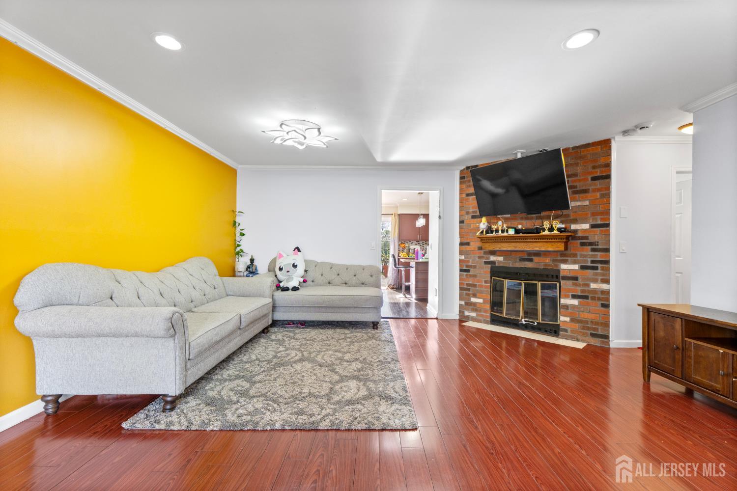 114 Pendleton Place Old Bridge, NJ 08857 - Photo 10 of 49 a living room with furniture and a flat screen tv