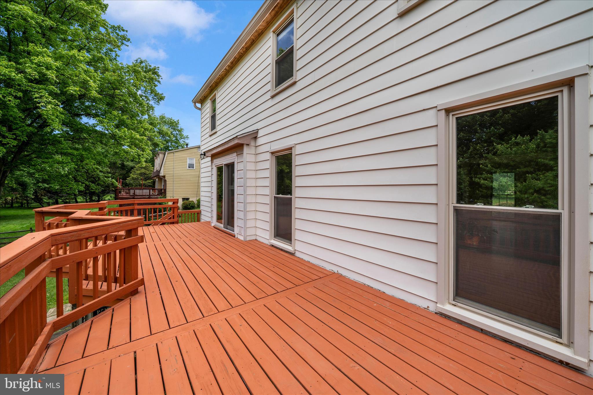 16000 Narrows Terrace Silver Spring, MD 20906 - Photo 43 of 54 a view of backyard with a deck and wooden floor