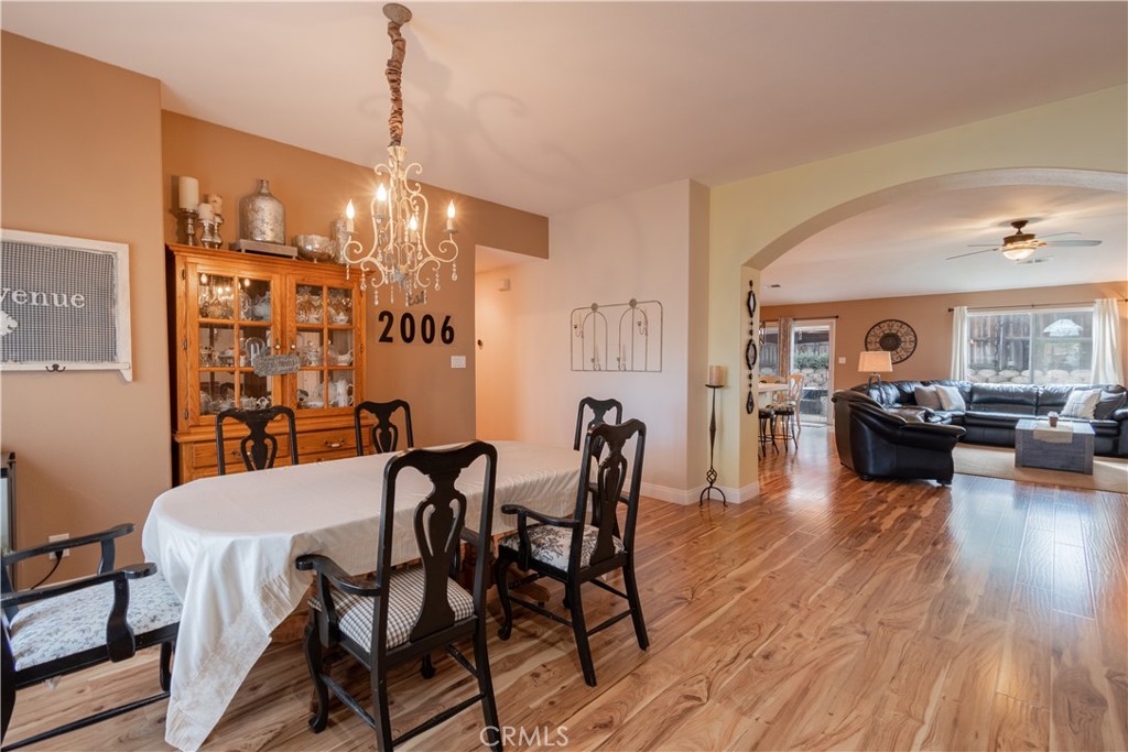 2660 Vineyard Circle Paso Robles, CA 93446 - Photo 3 of 39 a view of a dining room with furniture and wooden floor