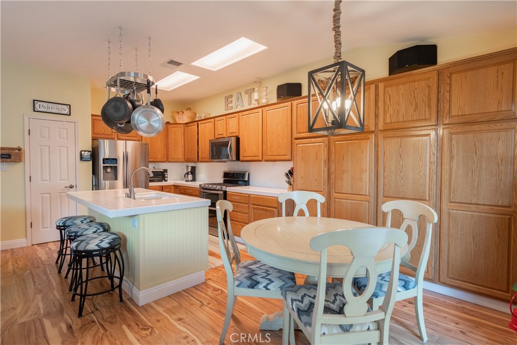 2660 Vineyard Circle Paso Robles, CA 93446 - Photo 7 of 39 a view of a dining room with furniture and wooden floor