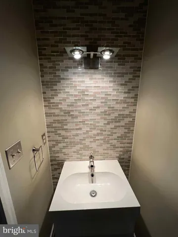 a bathroom with a sink and a toilet