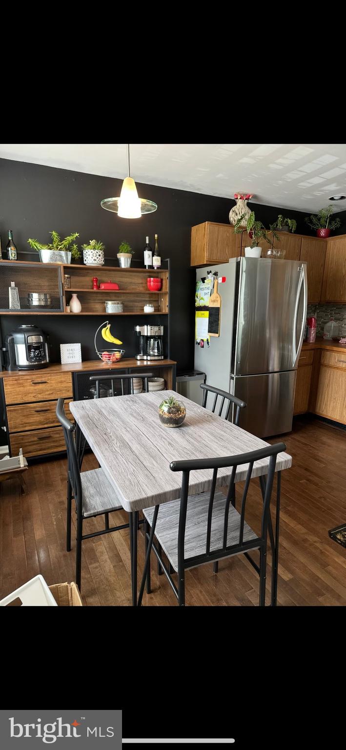 500 Crystal, Unit 19A Norristown, PA 19403 - Photo 5 of 11 a dining room with furniture and wooden floor