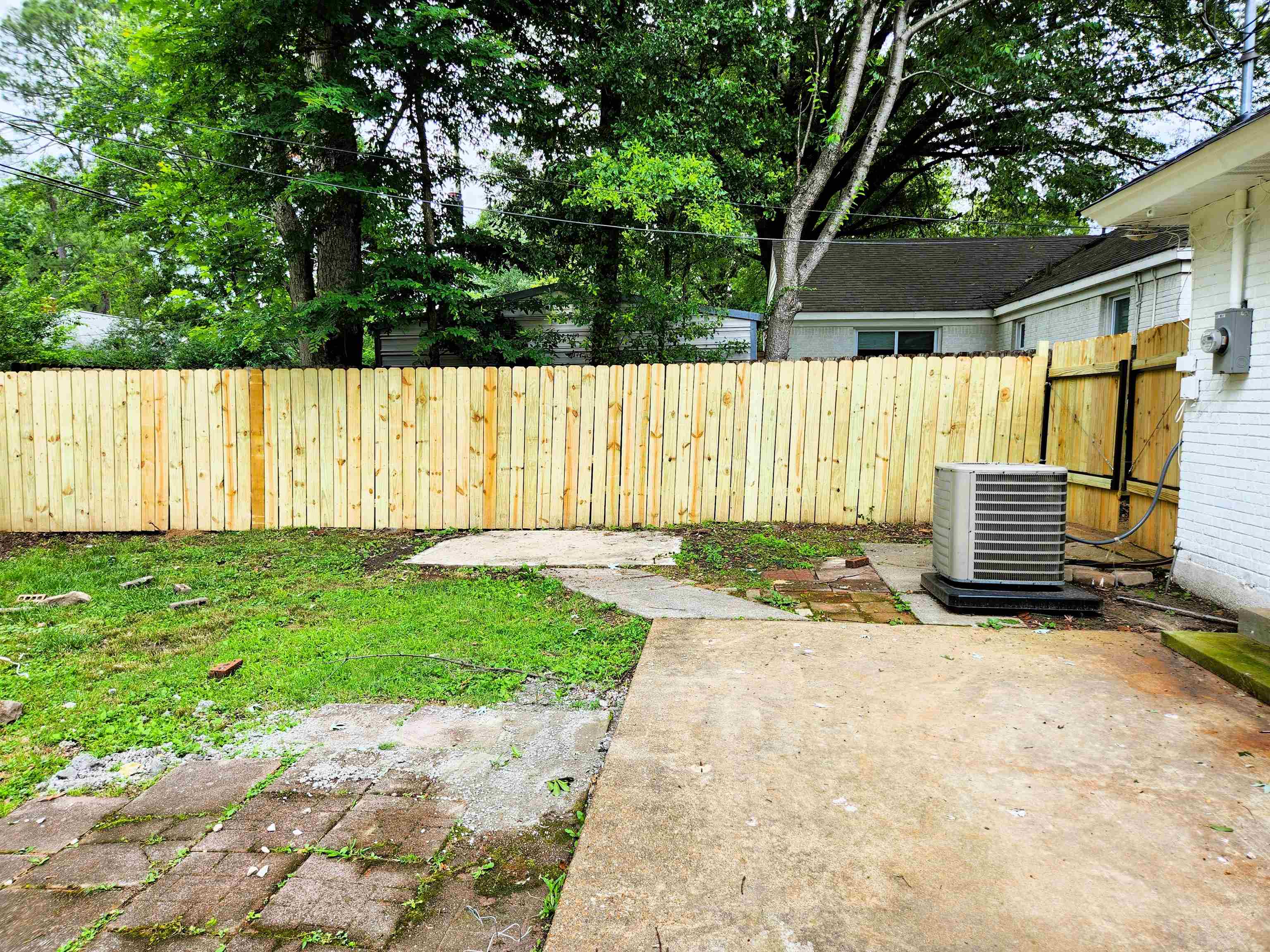 5030 Dee Road Memphis, TN 38117 - Photo 15 of 19 a view of a backyard with a small cabin