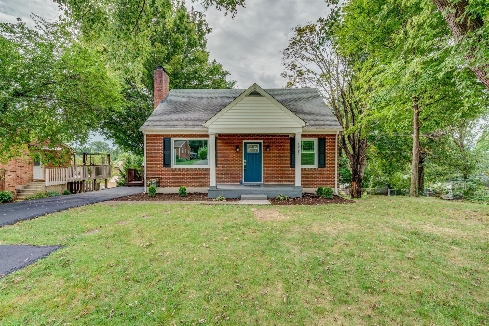 1963 Kiska Road Salem, VA 24153 - Photo 1 of 29 a view of a house with a yard and large tree