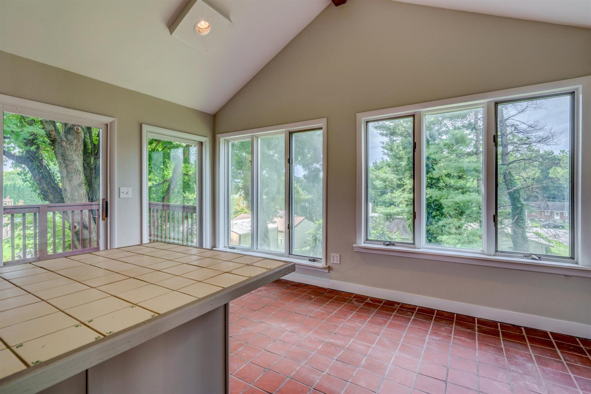 1963 Kiska Road Salem, VA 24153 - Photo 13 of 29 a bedroom with a bed and a large window