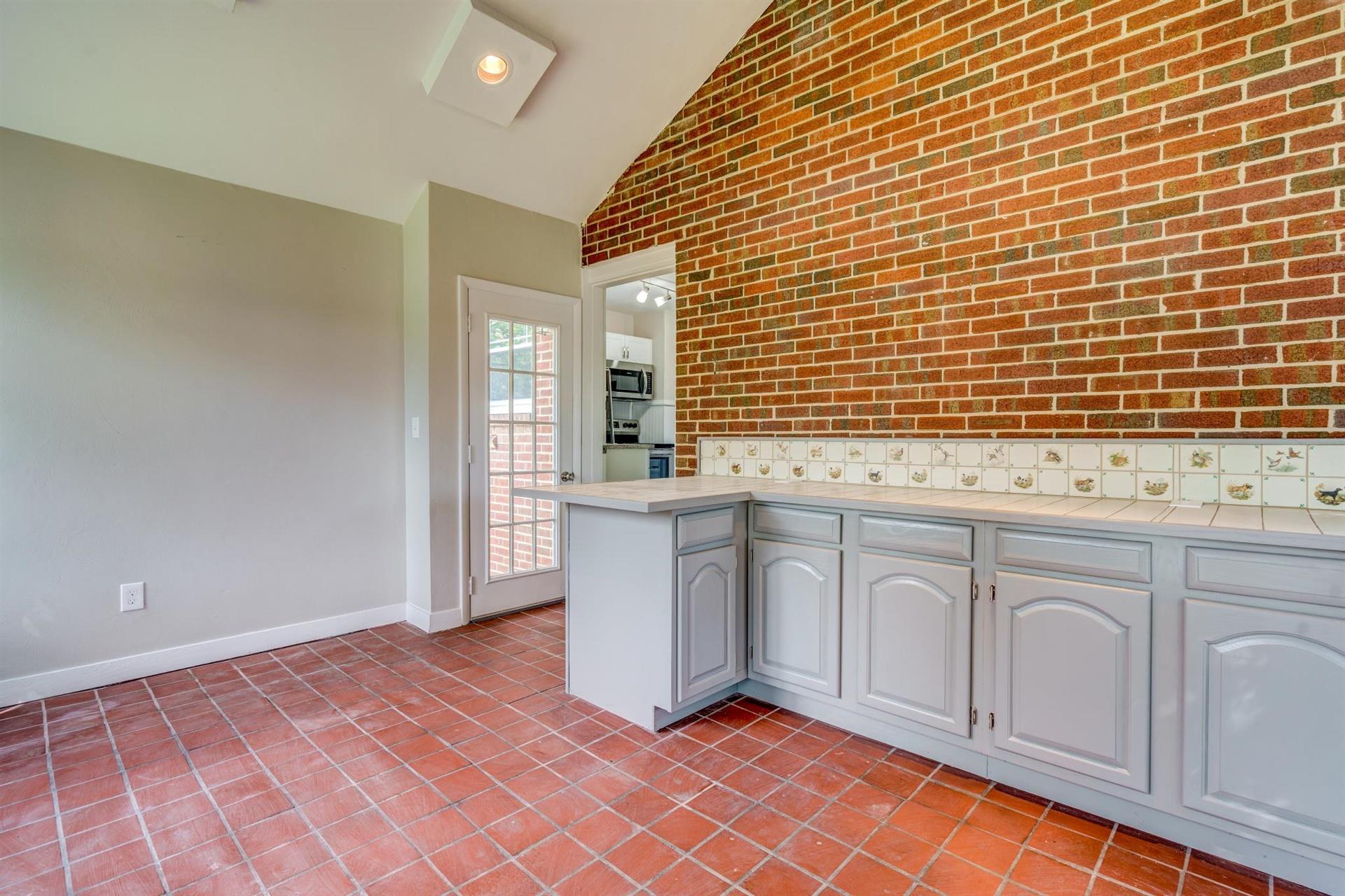 1963 Kiska Road Salem, VA 24153 - Photo 14 of 29 a view of a kitchen with granite countertop cabinets