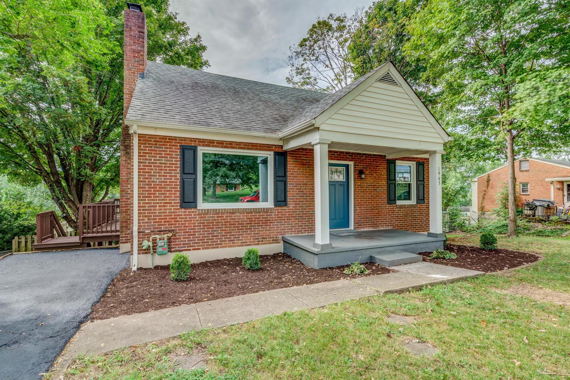 1963 Kiska Road Salem, VA 24153 - Photo 3 of 29 a front view of a house with garden