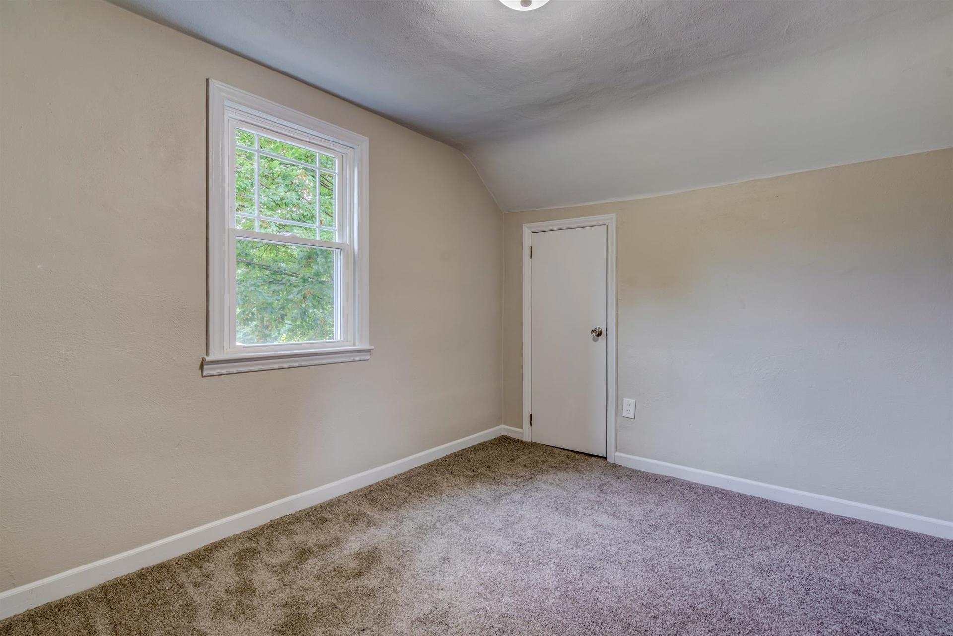 1963 Kiska Road Salem, VA 24153 - Photo 22 of 29 an empty room with a window
