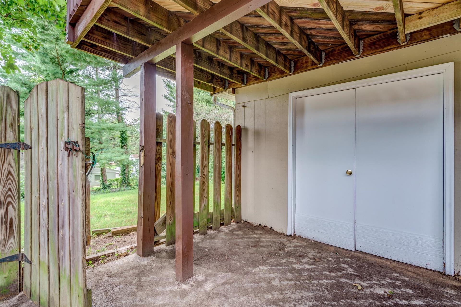 1963 Kiska Road Salem, VA 24153 - Photo 28 of 29 a view of backyard with large trees and wooden fence