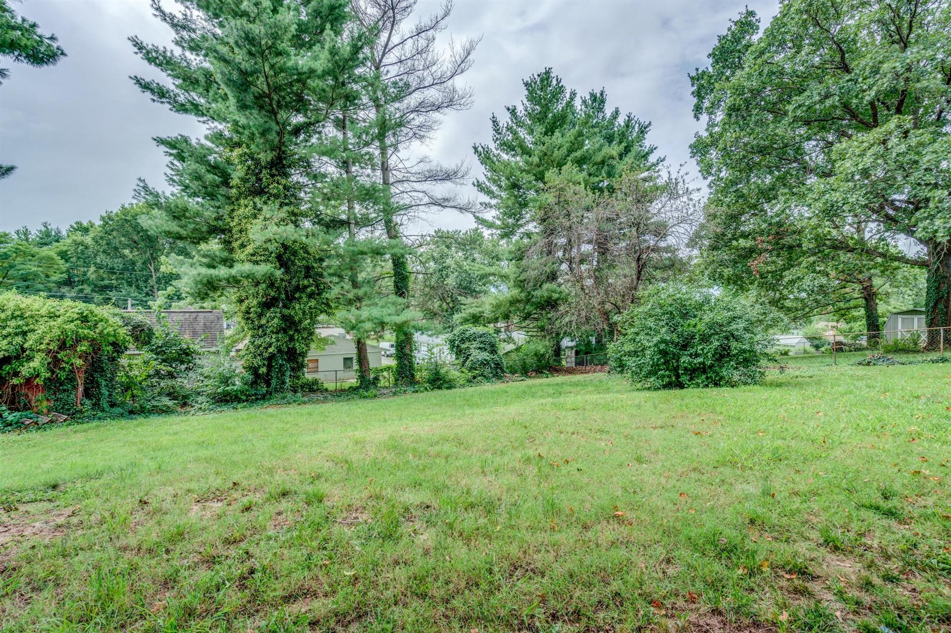 1963 Kiska Road Salem, VA 24153 - Photo 29 of 29 a view of a grassy field with trees in the background