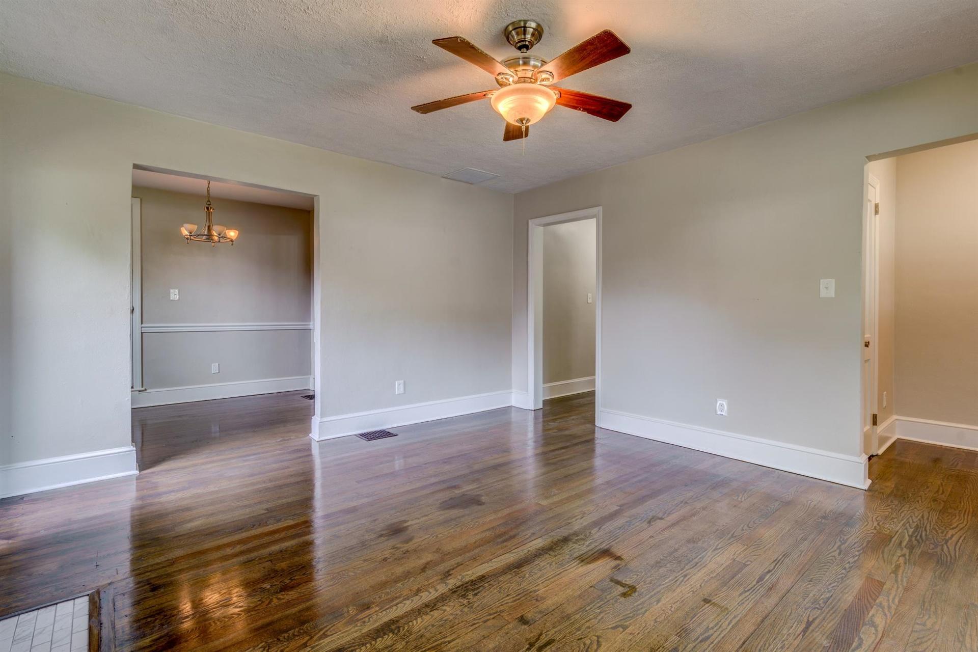 1963 Kiska Road Salem, VA 24153 - Photo 7 of 29 an empty room with wooden floor and door