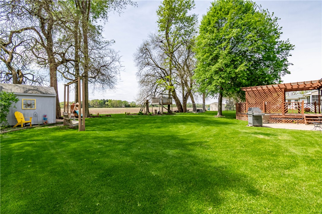 1011 Bunker Lane Decatur, IL 62526 - Photo 23 of 25 a view of yard with green space and trees