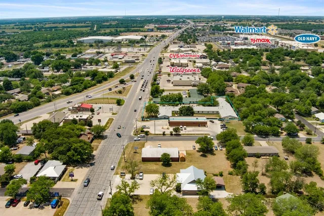 a view of road and trees