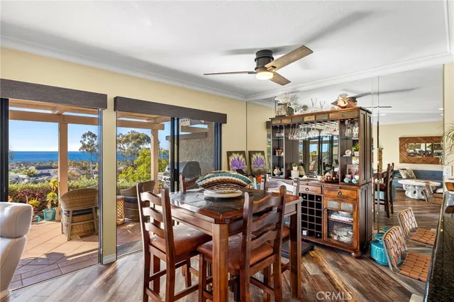 a kitchen with granite countertop a refrigerator stove and sink
