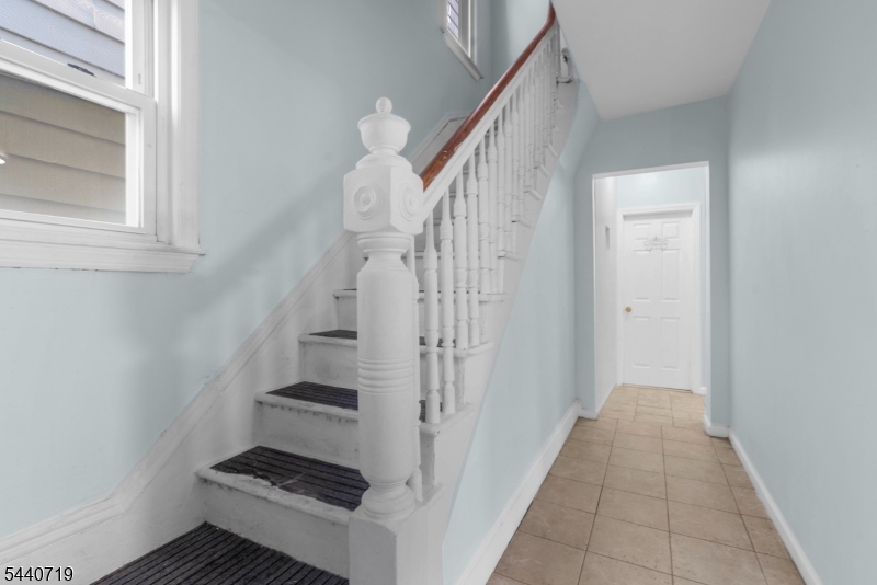 136 Smith Street Elizabeth, NJ 07201 - Photo 18 of 38 a view of an entryway with wooden floor