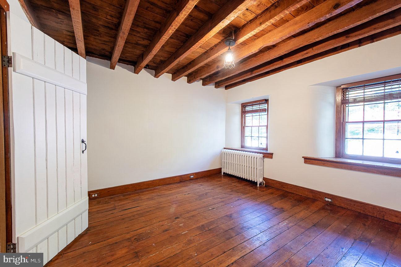 71 West Rose Valley Road Wallingford, PA 19086 - Photo 19 of 36 Beamed ceilings in front bedroom