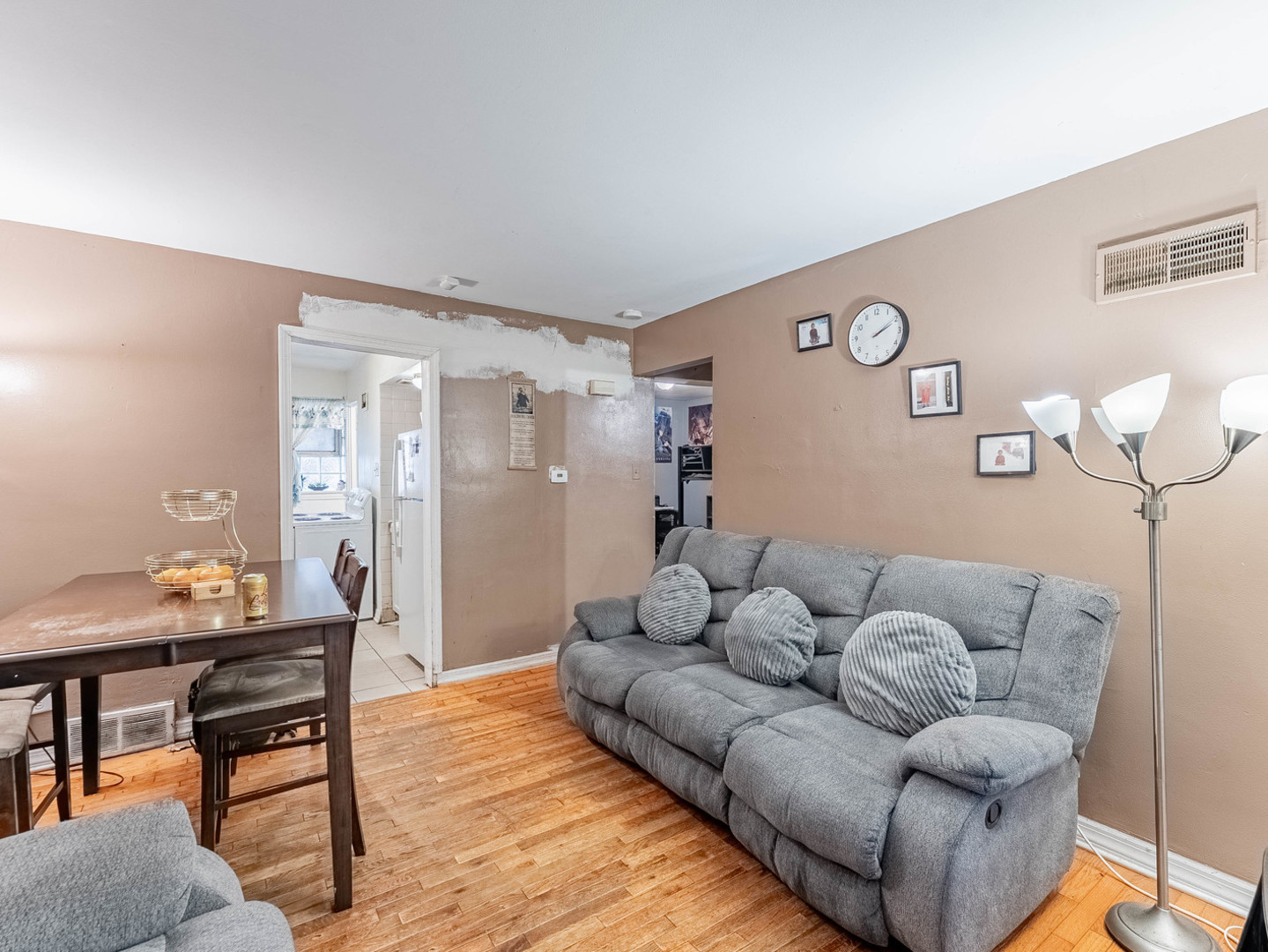 3847 Euclid Avenue Berwyn, IL 60402 - Photo 15 of 32 a living room with furniture and a table