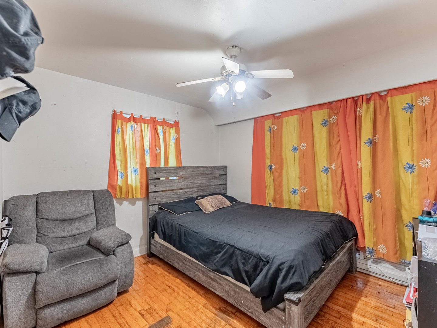 3847 Euclid Avenue Berwyn, IL 60402 - Photo 17 of 32 a bedroom with a bed couch and window