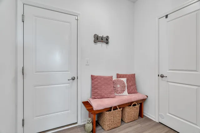 a view of room with window and wooden floor