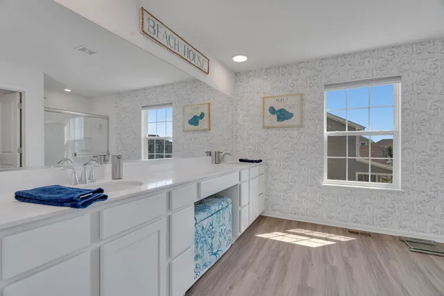 a kitchen with a sink cabinets and window