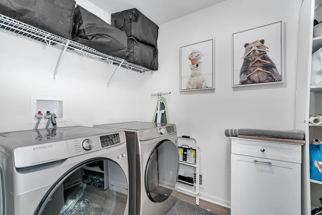 a view of storage and utility room with racks on the wall