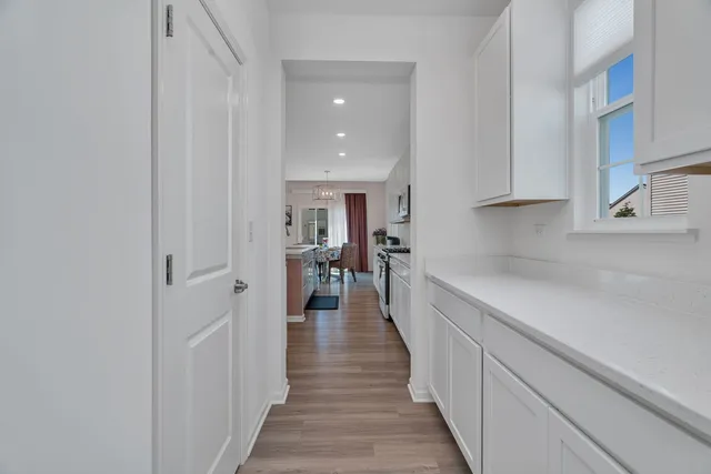 a view of a kitchen with a sink