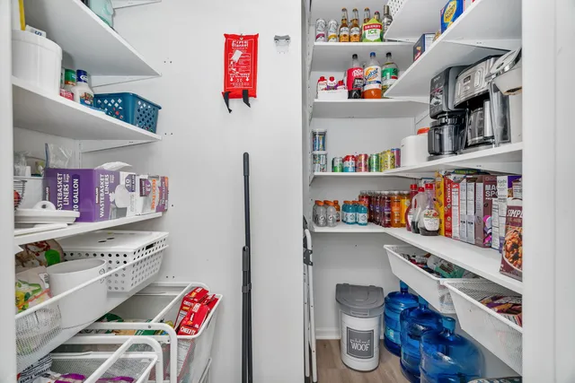 a room with furniture and a book shelf