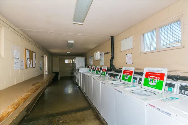 a view of backyard with swimming pool and deck