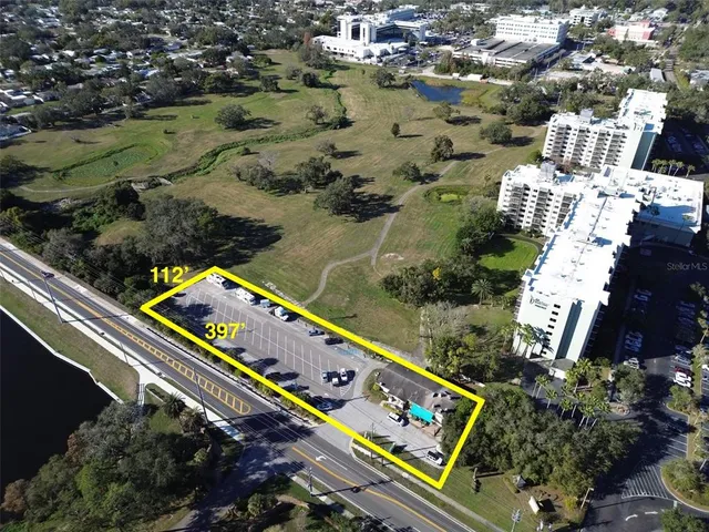 a view of a balcony with chairs and a table