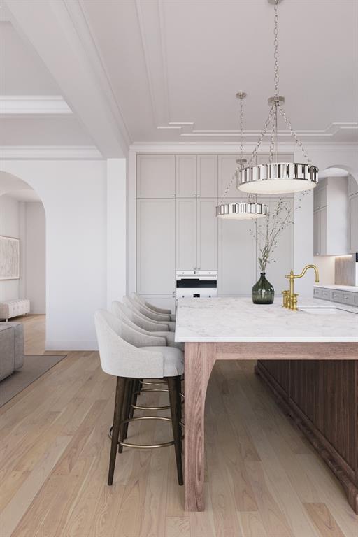 4049 Clover Lane Dallas, TX 75220 - Photo 8 of 33 a view of a kitchen with kitchen island a sink and chairs