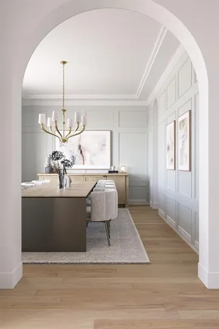 a view of living room with furniture and a chandelier