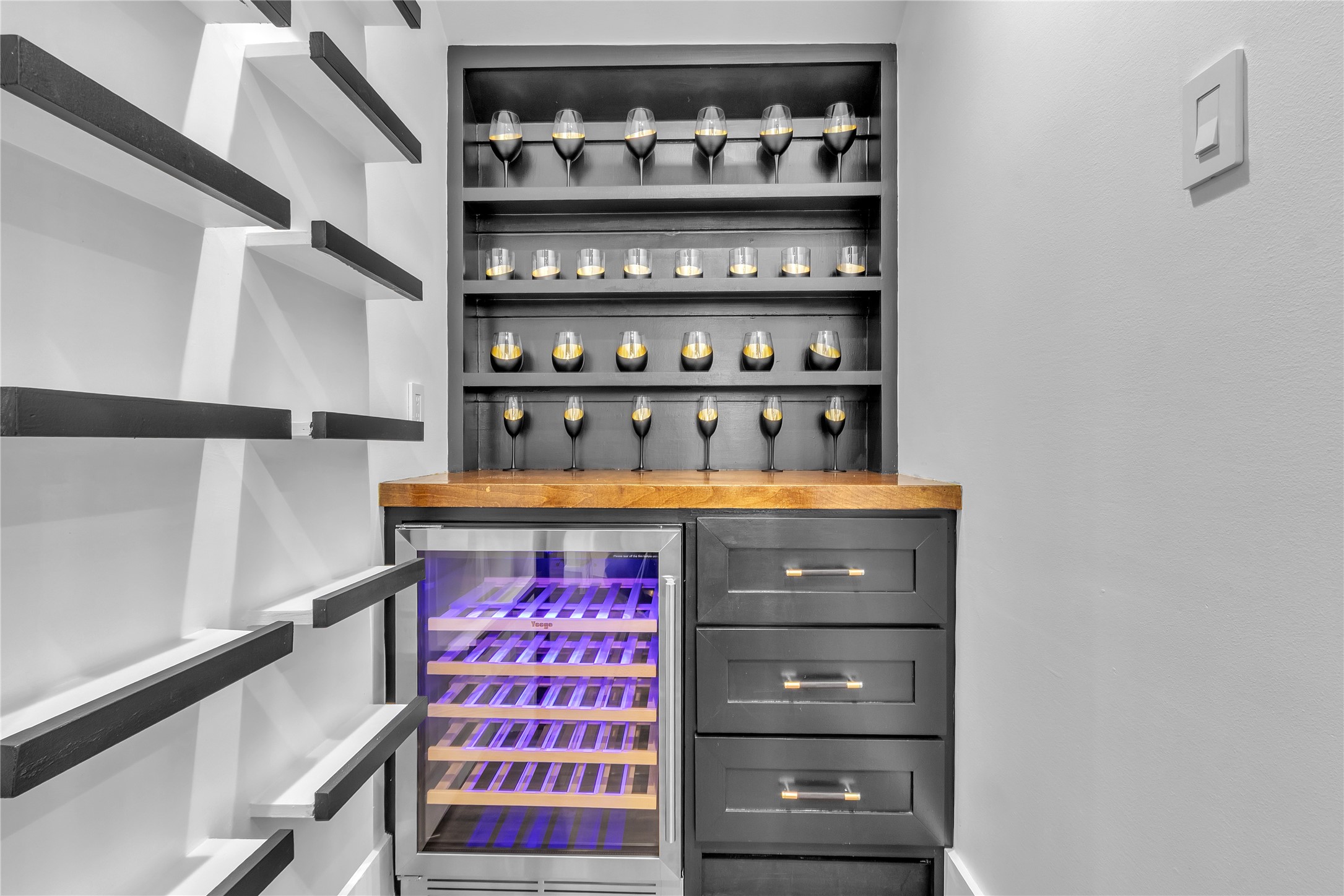 15406 Torry Pines Road Houston, TX 77062 - Photo 11 of 50 a view of walk in closet with clothes and shoes