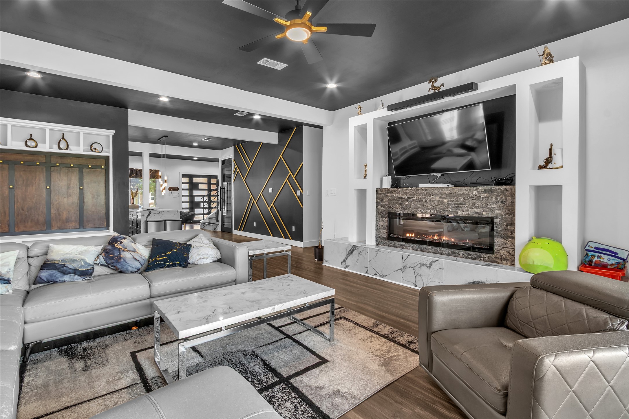 15406 Torry Pines Road Houston, TX 77062 - Photo 18 of 50 a living room with furniture and a flat screen tv