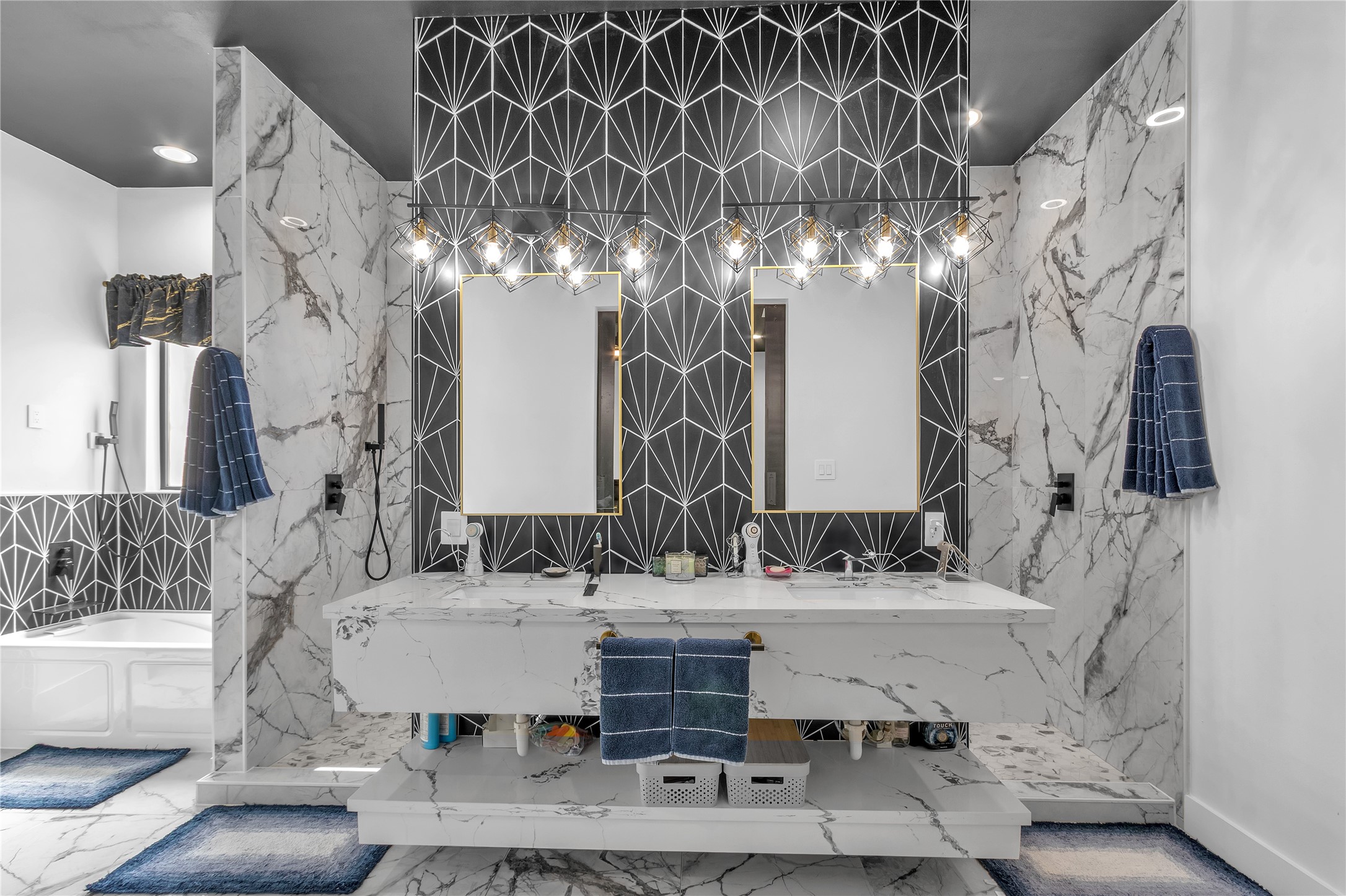 15406 Torry Pines Road Houston, TX 77062 - Photo 21 of 50 a bathroom with a sink and a mirror with bathtub