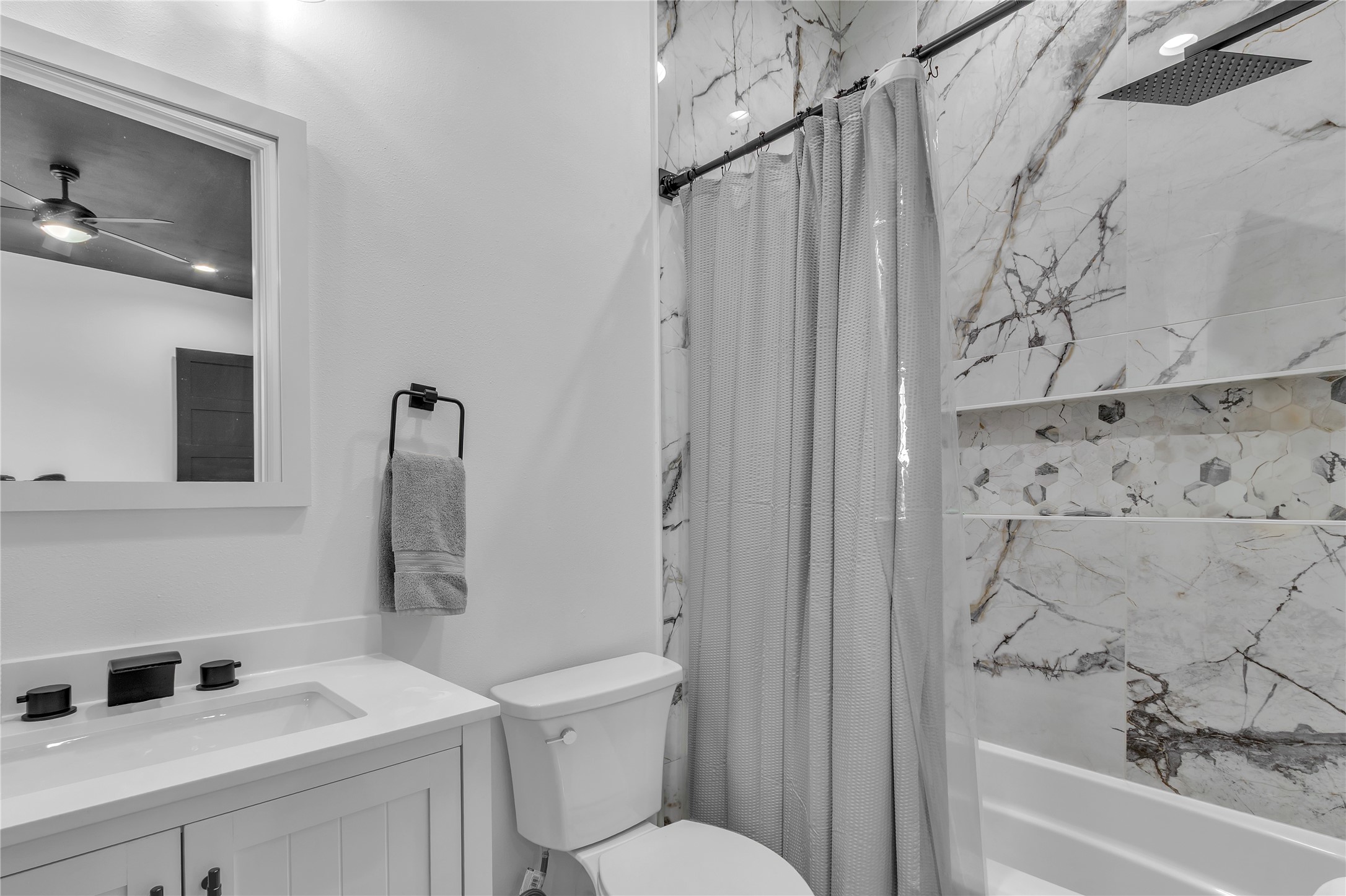 15406 Torry Pines Road Houston, TX 77062 - Photo 36 of 50 a bathroom with a sink a toilet and shower