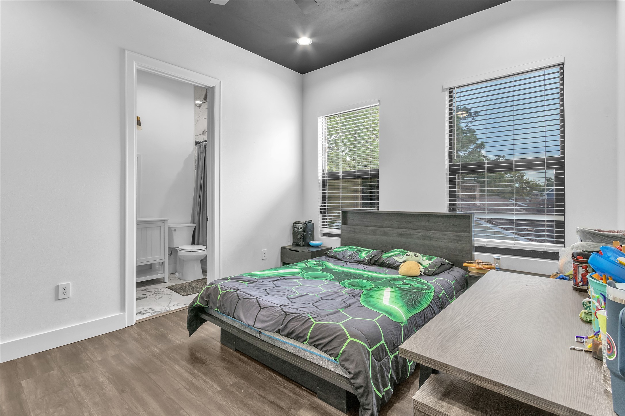 15406 Torry Pines Road Houston, TX 77062 - Photo 40 of 50 a bedroom with a bed and a window