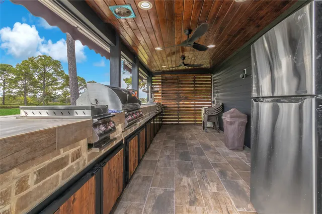 a open kitchen with a large window