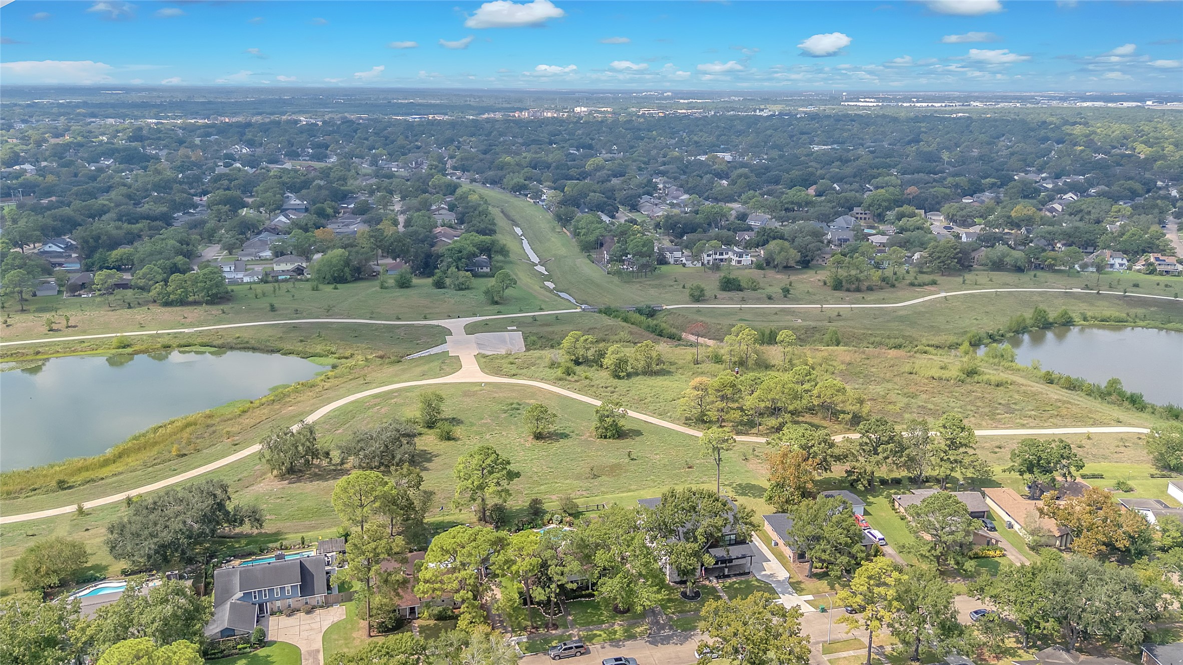 15406 Torry Pines Road Houston, TX 77062 - Photo 48 of 50 a view of a lake with a mountain
