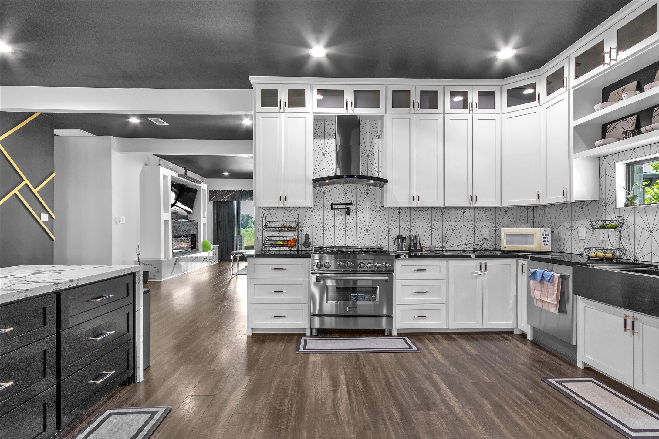 15406 Torry Pines Road Houston, TX 77062 - Photo 7 of 50 a kitchen with stainless steel appliances granite countertop a stove and cabinets