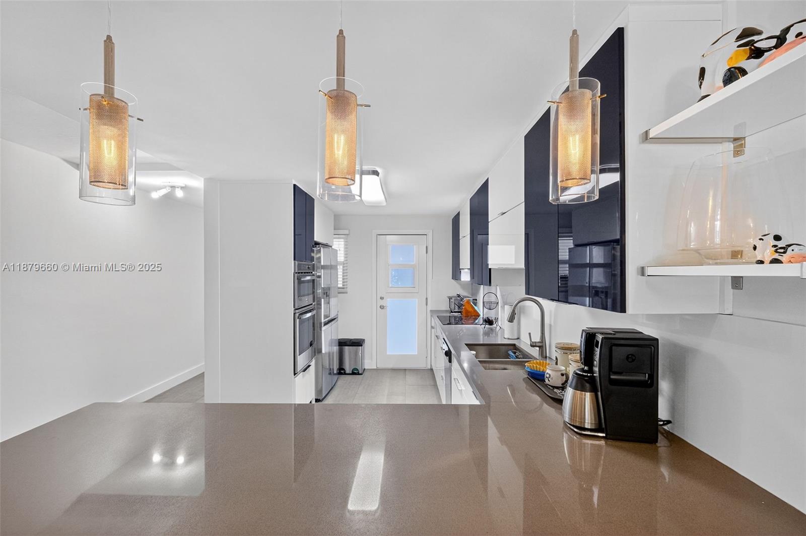 240 Galen Drive, Unit 207 Key Biscayne, FL 33149 - Photo 6 of 21 a living room with furniture and a fireplace