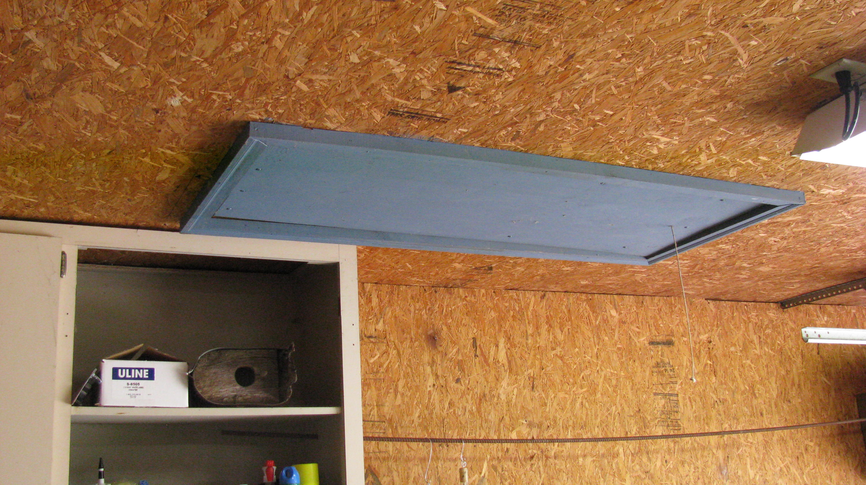 201 George Smith Road Crossville, TN 38571 - Photo 24 of 34 Garage drop down ladder to storage