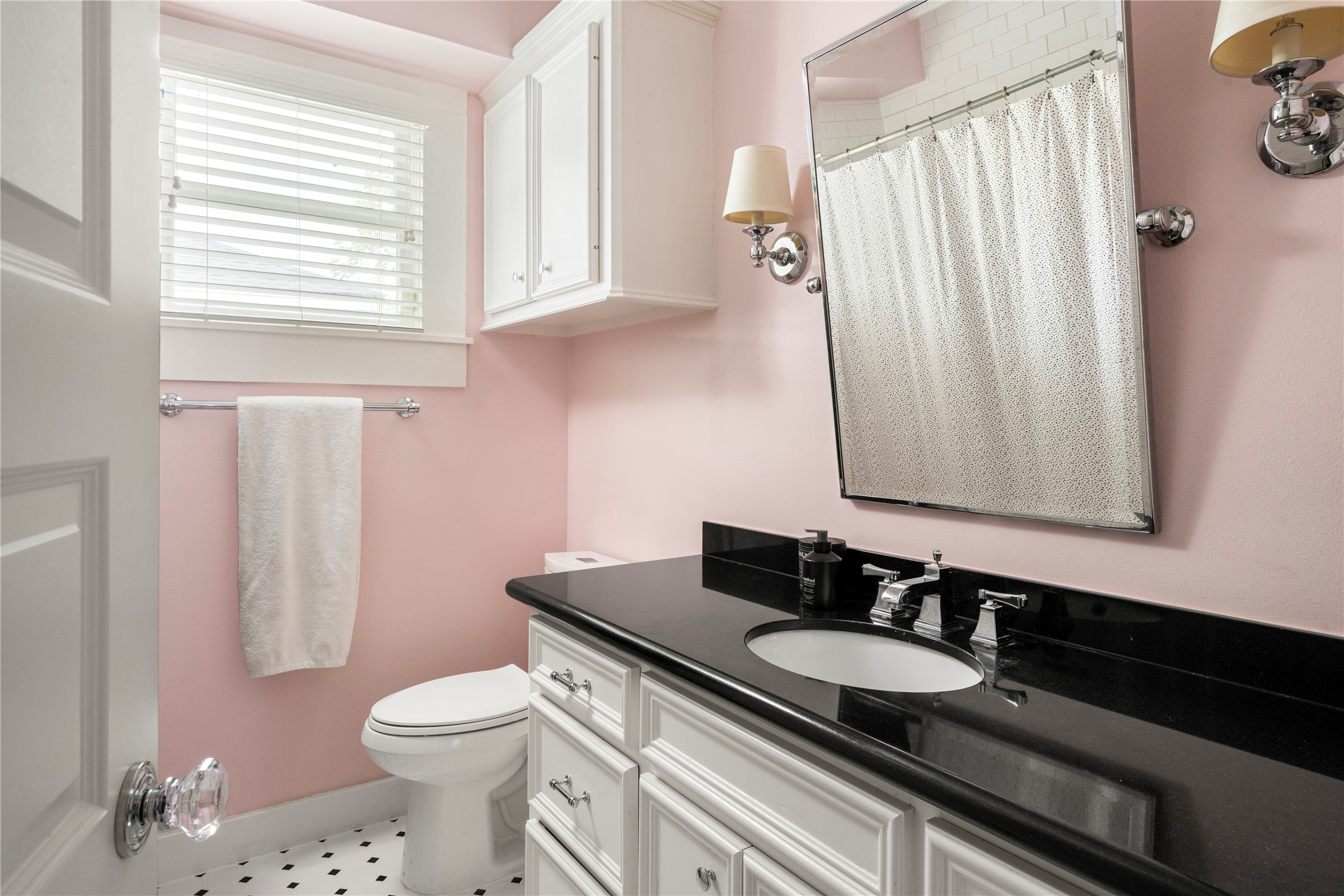 602 Aurora Street Houston, TX 77008 - Photo 19 of 36 Bathroom with updated finishes and a clean, simple layout. Natural light softens the space and highlights the materials. A functional design that complements the overall style of the home.