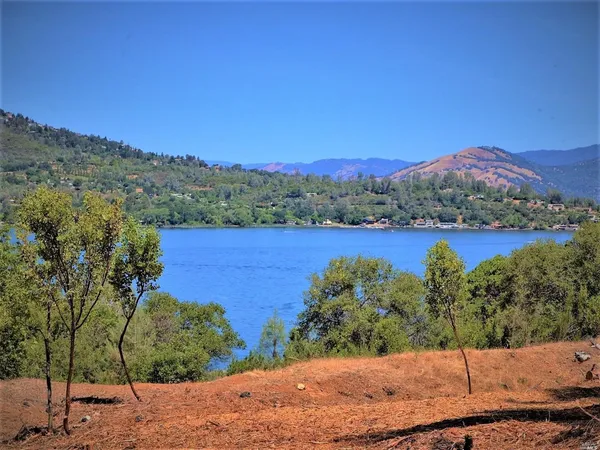 a view of a lake with mountains in the background