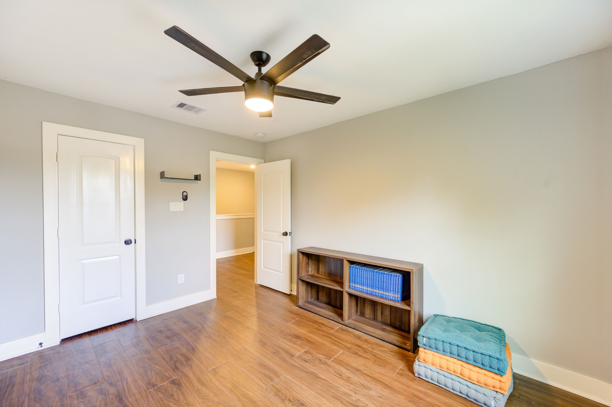 436 Owens Street Houston, TX 77029 - Photo 20 of 33 a living room with stainless steel appliances wooden floor and a window