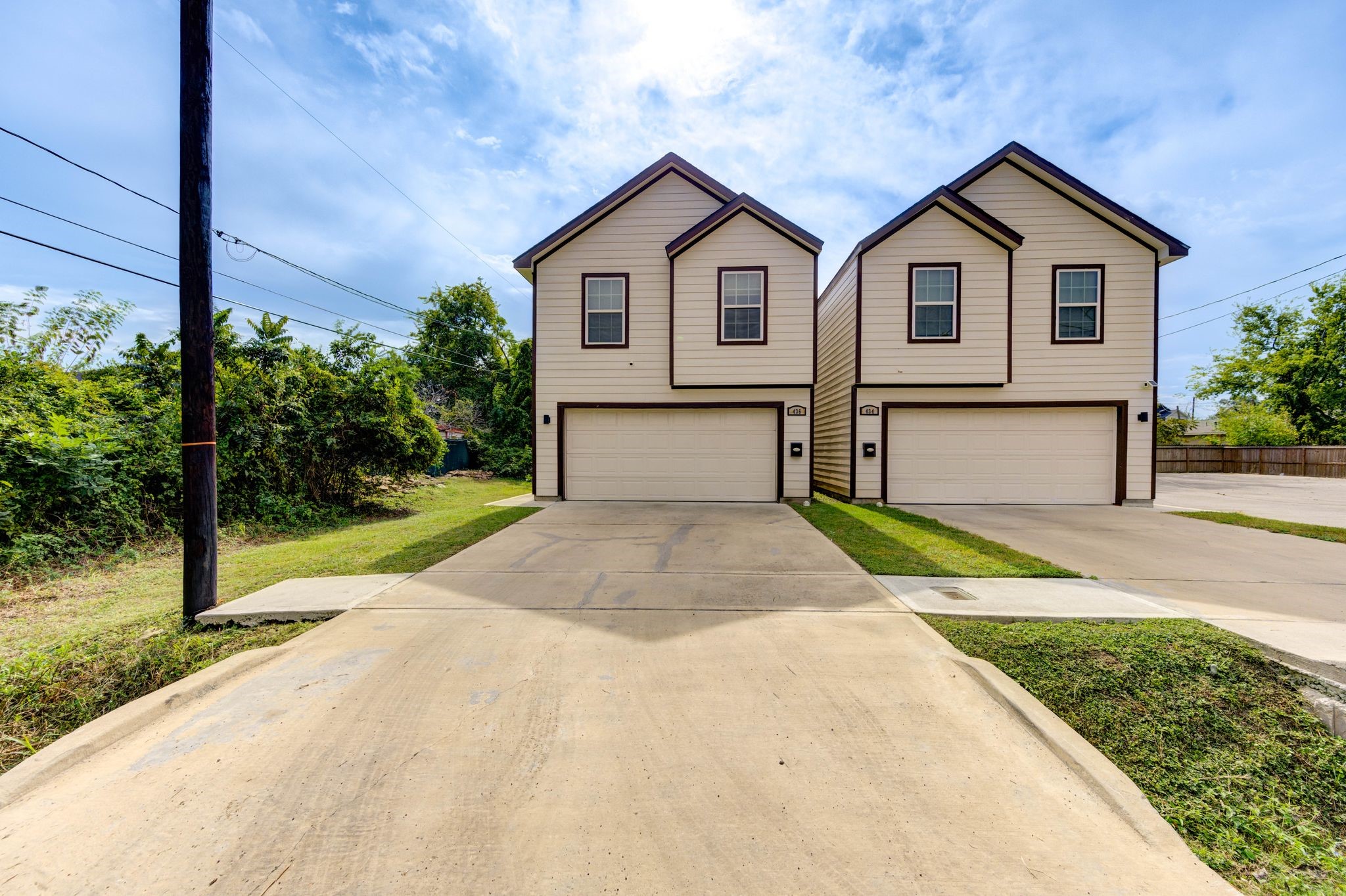 436 Owens Street Houston, TX 77029 - Photo 2 of 33 a front view of a house with a yard and garage